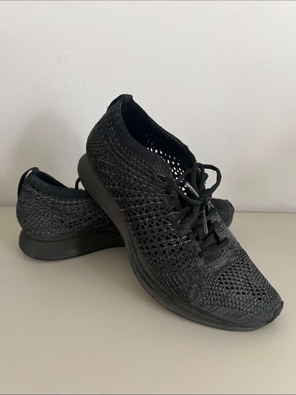 Nike Women's Black FlyKnit Racer Triple Black